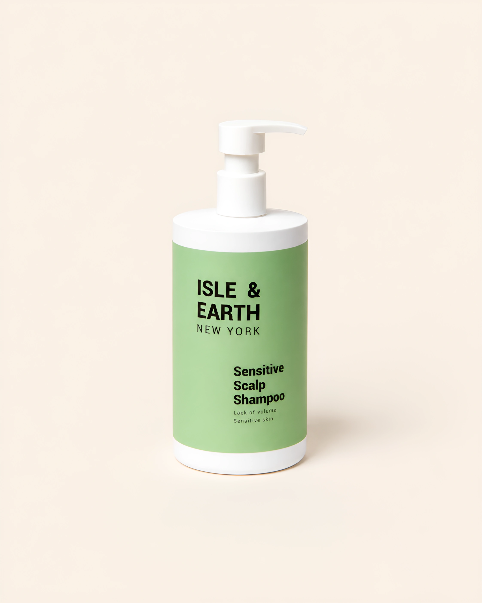 Isle & Earth Sensitive Scalp Shampoo white pump bottle with sage green label on cream background