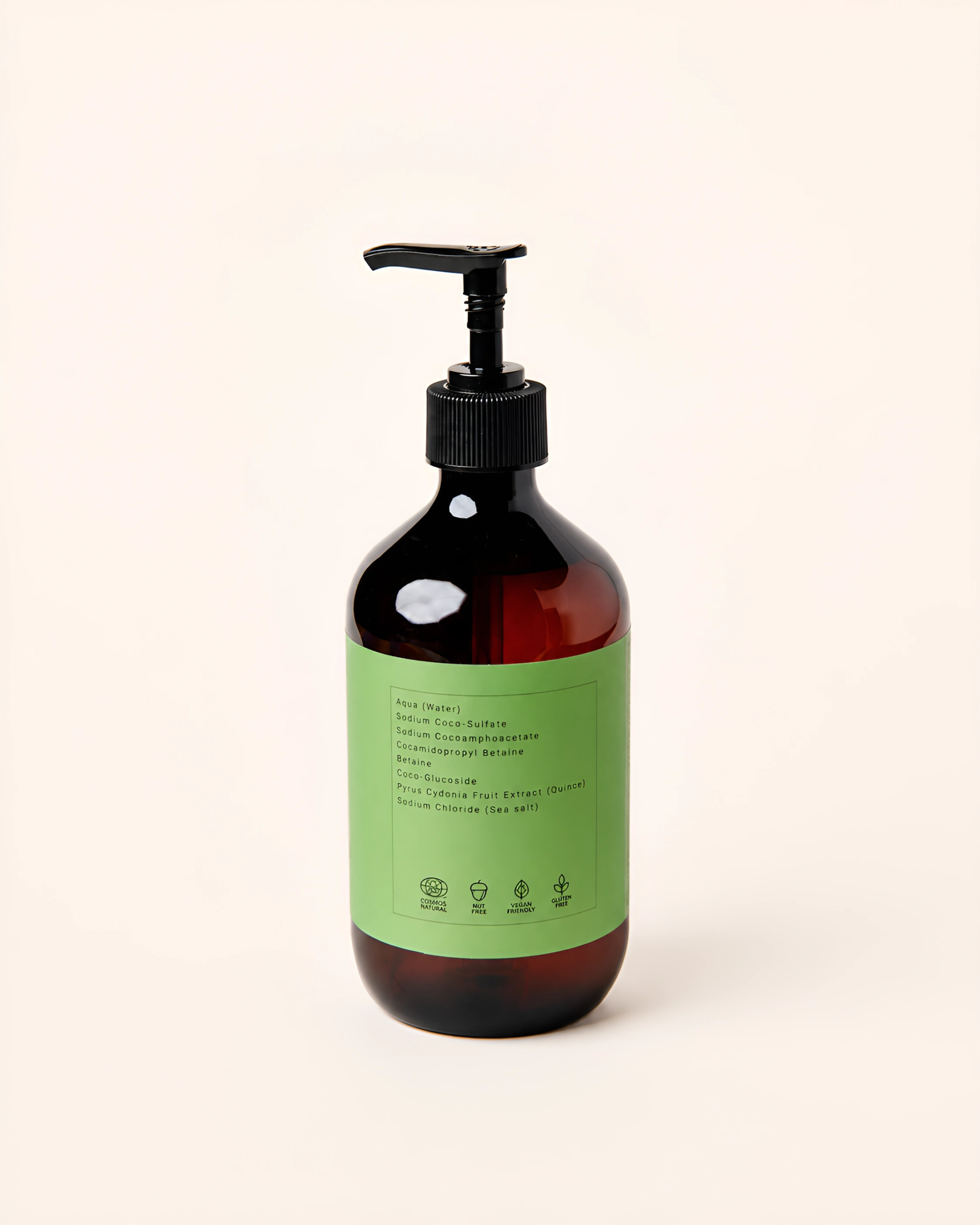 Isle & Earth Hand & Body Wash bottle back showing ingredients list including Quince Fruit Extract and COSMOS Natural certification